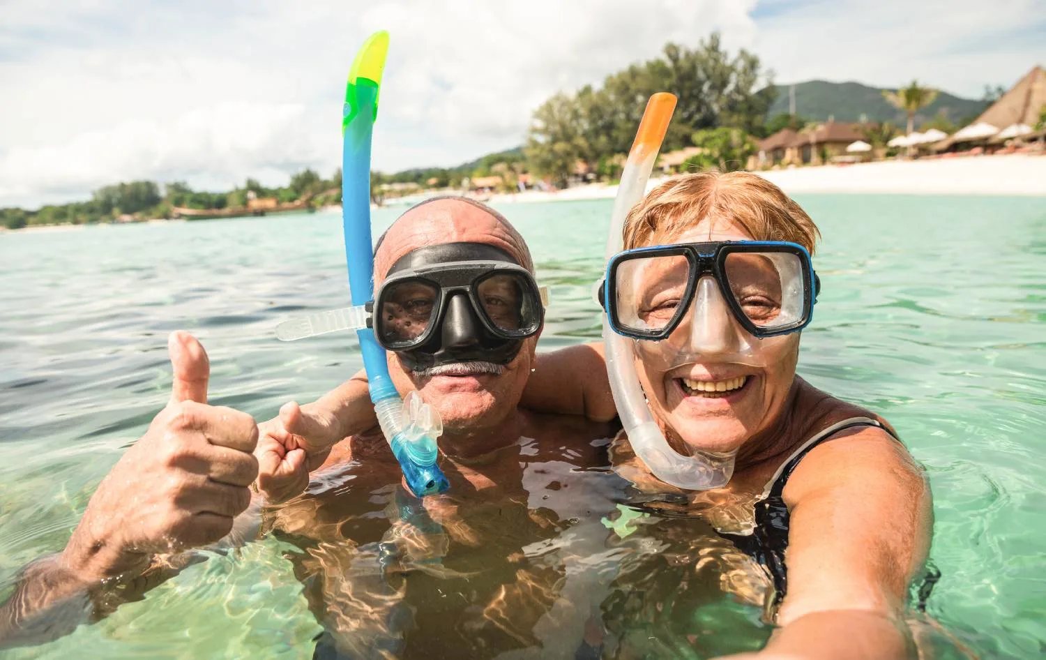 Senior couple happy taking selfie and wearing snorkeling gear